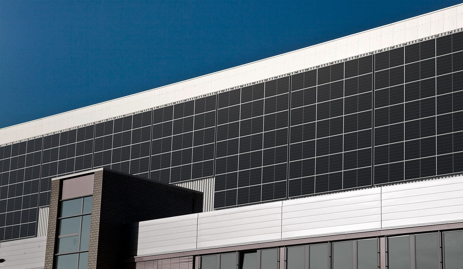 Photovoltaic system on trapezoidal sheet metal façade with MultiRail